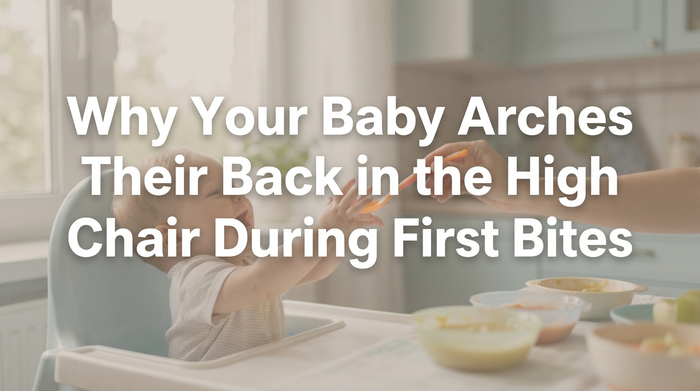 Baby arching back in high chair during mealtime with parent holding spoon