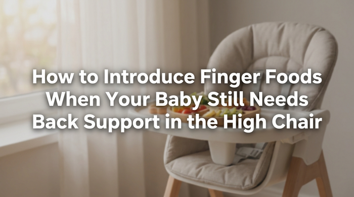 Baby reaching for soft finger foods in a supportive high chair