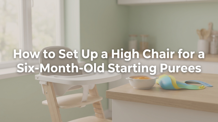 Baby sitting upright in high chair being fed purees by parent