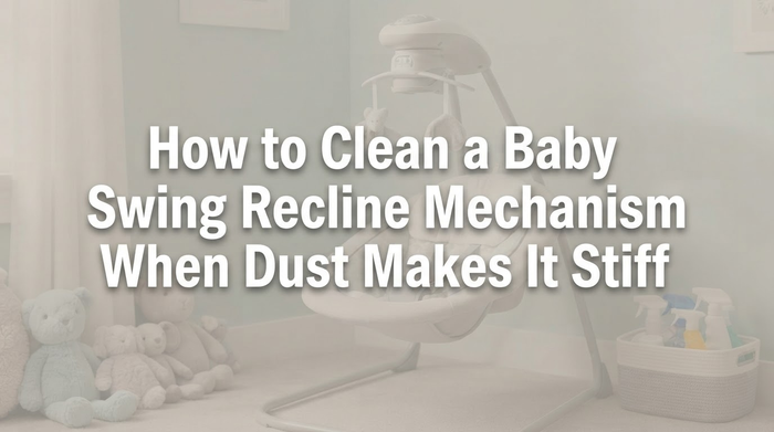 Baby swing recline mechanism close-up with dust and cleaning cloth
