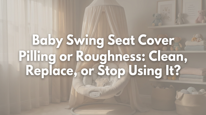 Close-up view of a baby swing seat cover showing fabric texture and surface detail