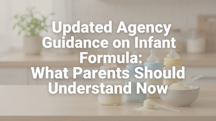 Parent preparing baby formula bottle in soft morning light