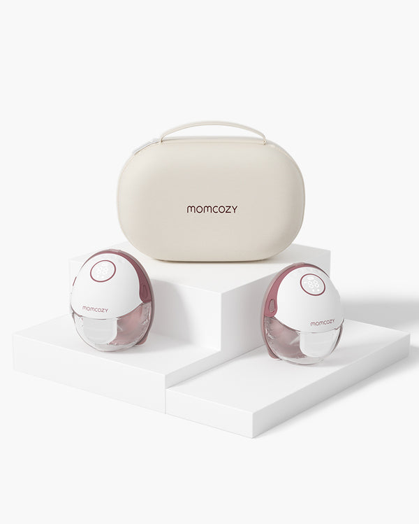 Momcozy M6 hands-free breast pump set in carrying case, white and pink design.