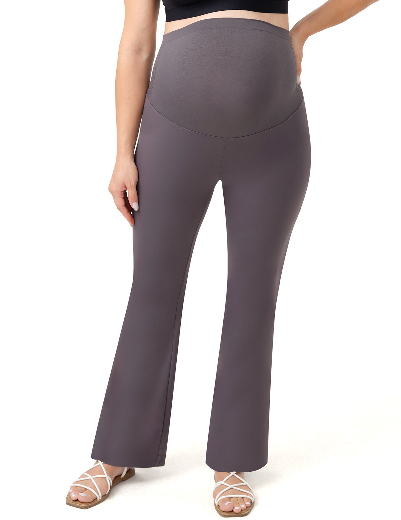 Flared maternity leggings showcasing a supportive design for growing baby bumps.