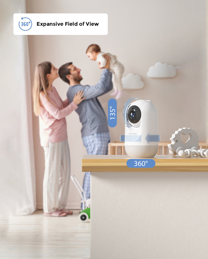 Momcozy 4.3" HD Video Baby Monitor BM02 demonstrating 360-degree expansive field of view with 135-degree vertical rotation. Family with mother, father, and baby in the background.