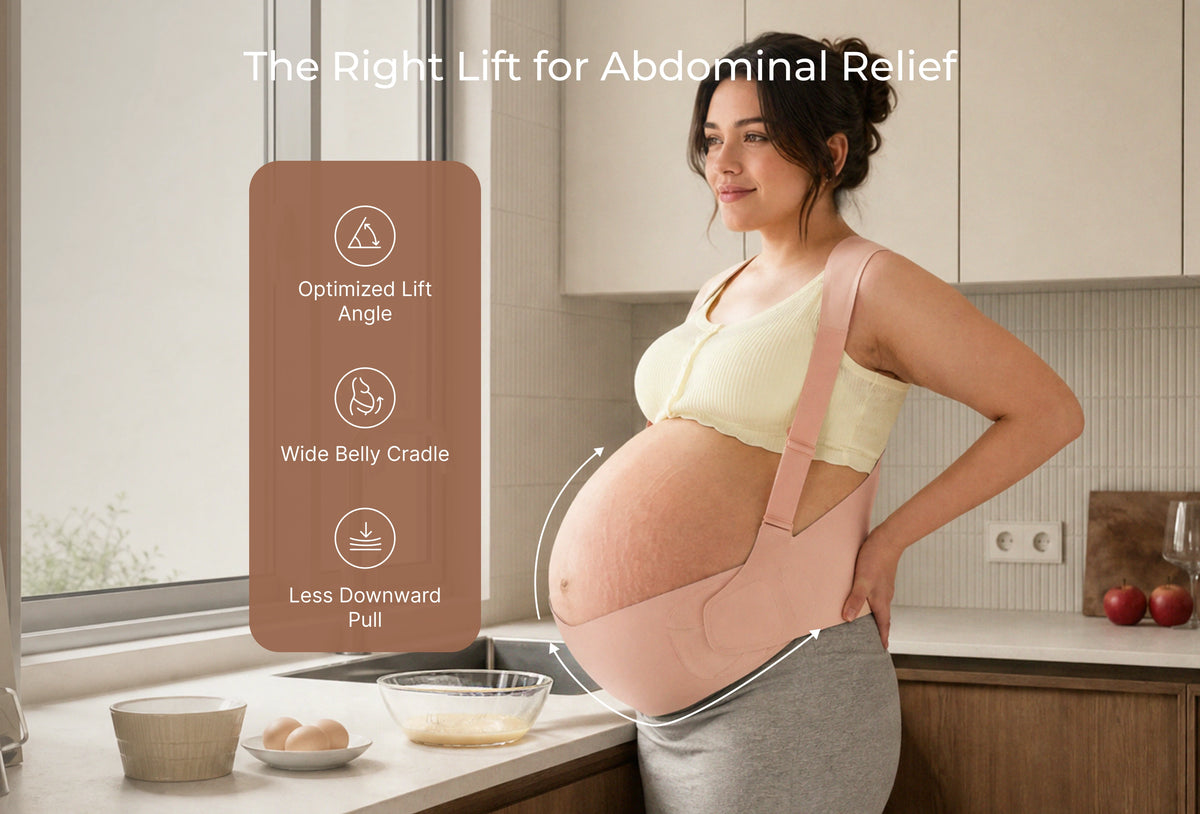 Pregnant woman wearing the oyster pink Momcozy belly band showing the wide cradle and optimized lift angle.