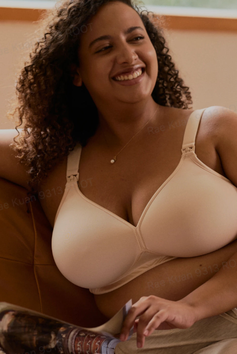 A smiling mother wearing the AirMesh bra