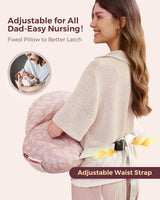 Multifunctional adjustable nursing pillow, pink leaf print, with secure waist strap.