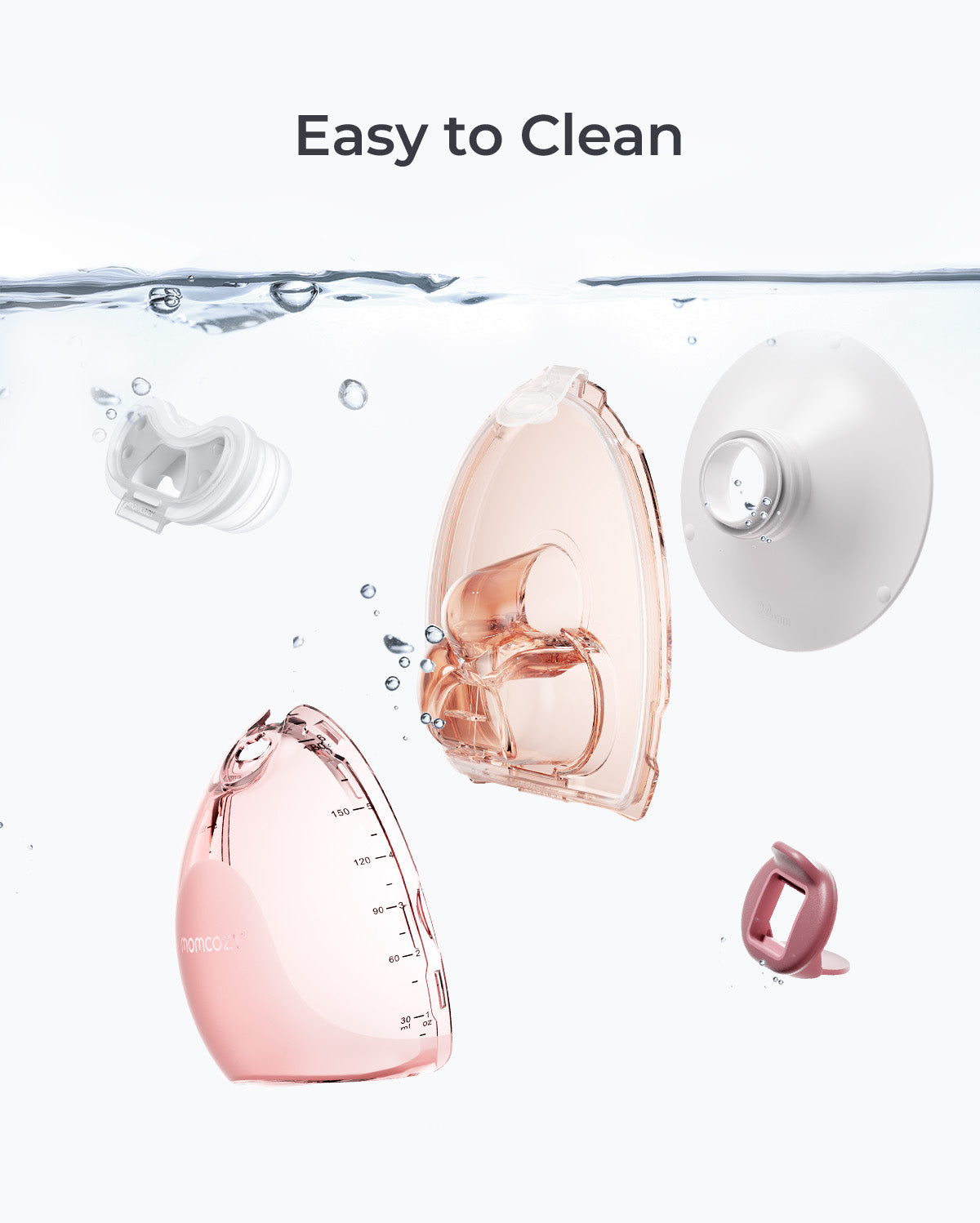 Momcozy Air 1 breast pump parts, including pink collector with measurements and flange, submerged in water for easy cleaning.