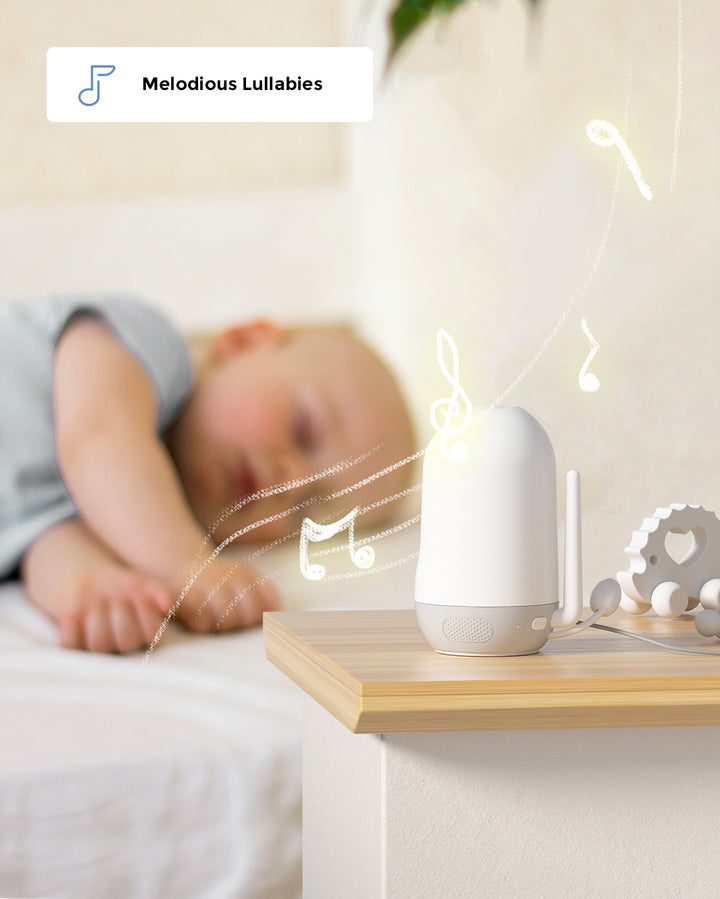 Baby sleeping peacefully with a 4.3" HD video baby monitor BM02 on a nightstand emitting melodious lullabies