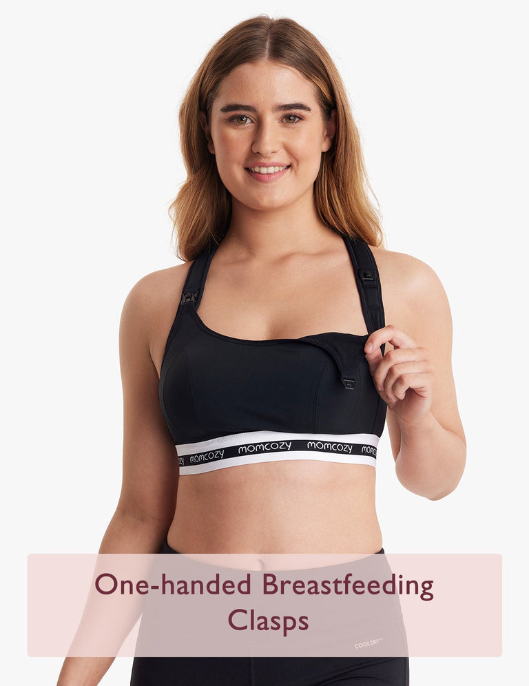 Translation missing: en.Woman wearing black low impact nursing sports bra with Momcozy logo and one-handed breastfeeding clasps, text 'One-handed Breastfeeding Clasps' displayed at bottom