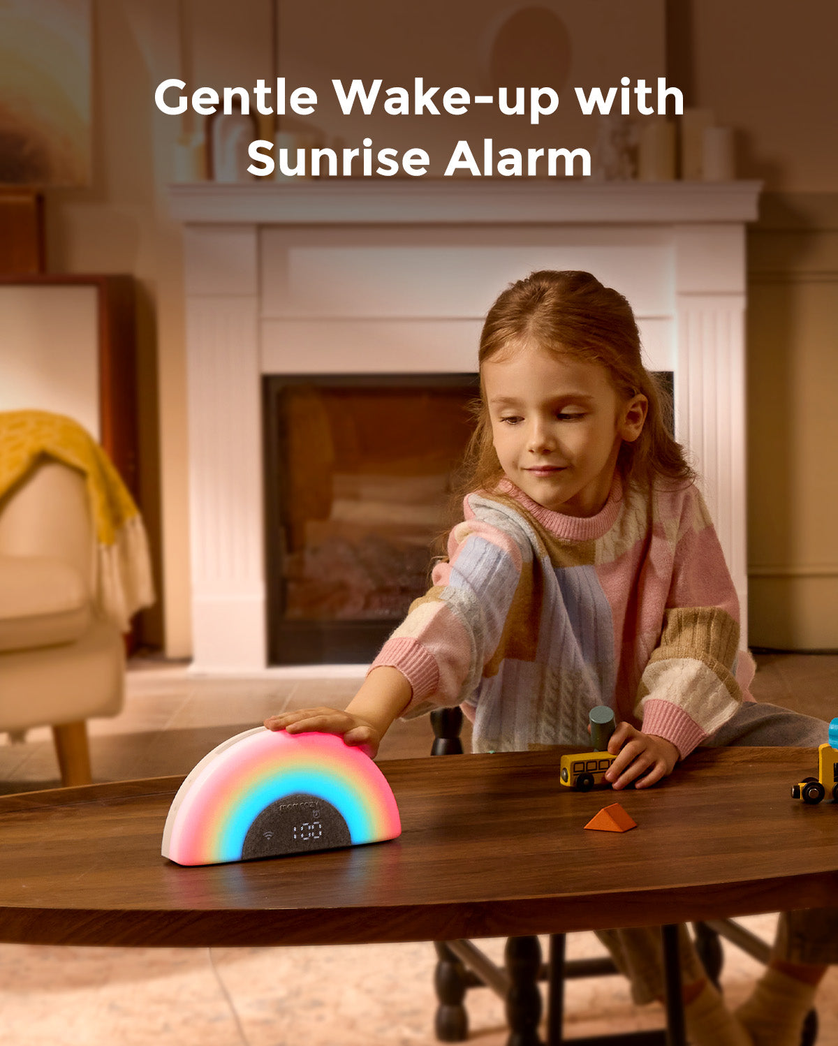 Momcozy DreamSync baby sound machine with rainbow light and sunrise alarm for children. Soft lighting for gentle wake-up