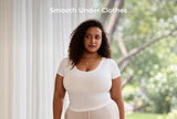 Woman wearing the AirMesh Busty Nursing Bra under a fitted top, showing a smooth silhouette