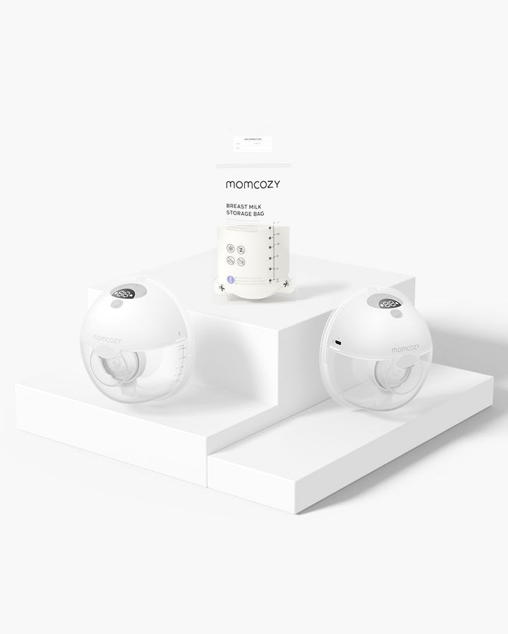 Momcozy M5 Wearable Breast Pump set with breast milk storage bag on white platform