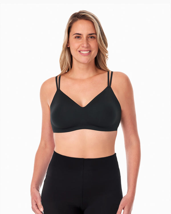 Woman wearing Momcozy black 3-in-1 FlexiStyle Convertible Everyday Bra, showcasing its comfortable double straps and seamless design.