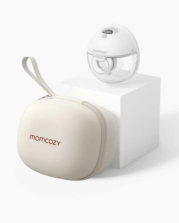 Momcozy M5 Wearable Breast Pump with cream storage case on a white pedestal.