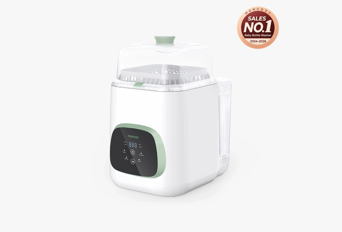 Momcozy KleanPal Pro baby bottle washer and sterilizer on a kitchen counter