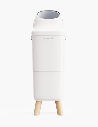 A white tall bin named momcozy is in the center with four beige legs and an opening on top, the background is white.
