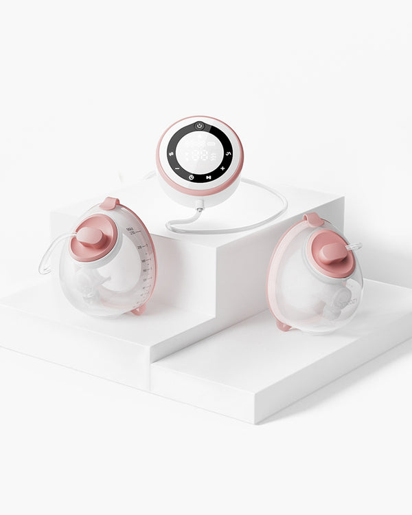 V1 Pro Hospital-Grade Wearable Breast Pump in pink with two collection cups.