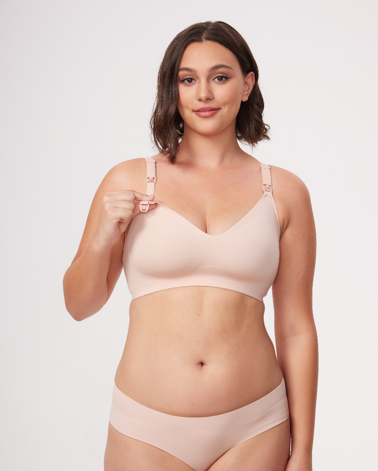 Model in light taupe Ultra Soft Seamless Nursing Bra YN21, showing easy-release clip for functional nursing and M5 pump use.