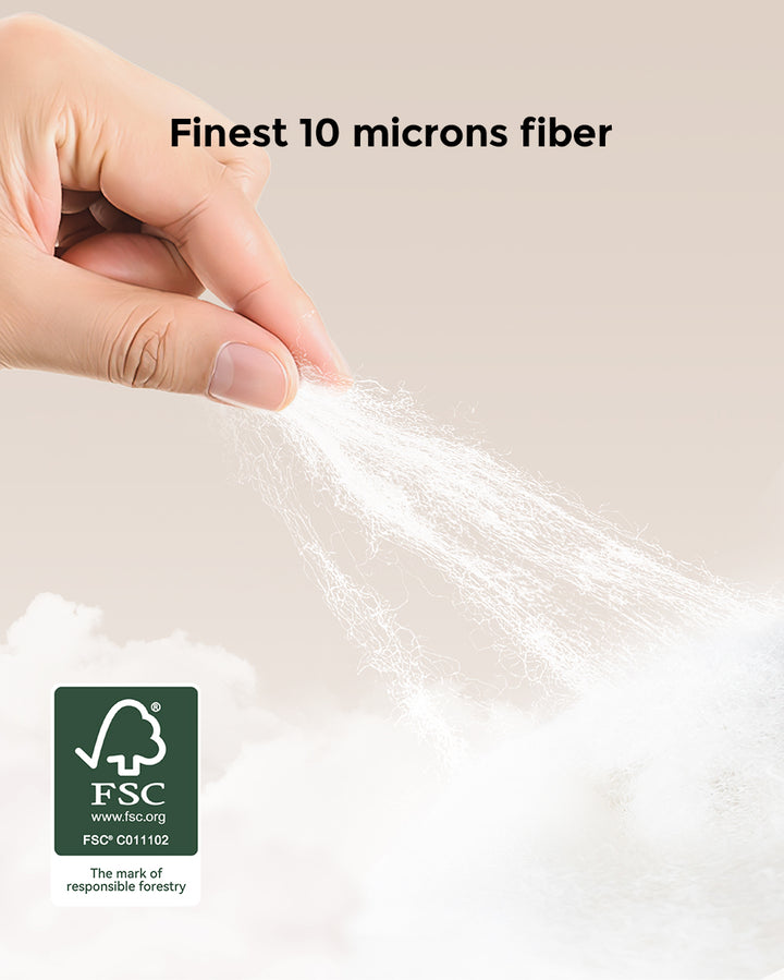 Hand holding ultra-fine 10 microns fiber, representing the softness of BabyCozy Softest Diapers by Momcozy, with FSC certification for responsible forestry.