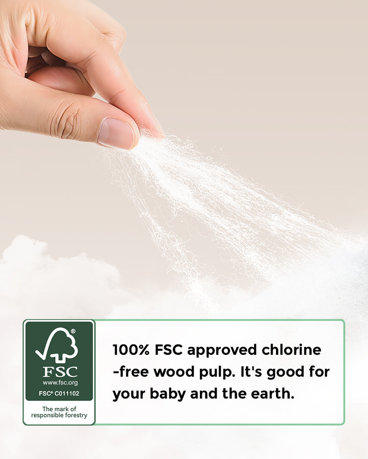 Hand holding soft white material with text '100% FSC approved chlorine-free wood pulp. It's good for your baby and the earth.' and FSC logo.