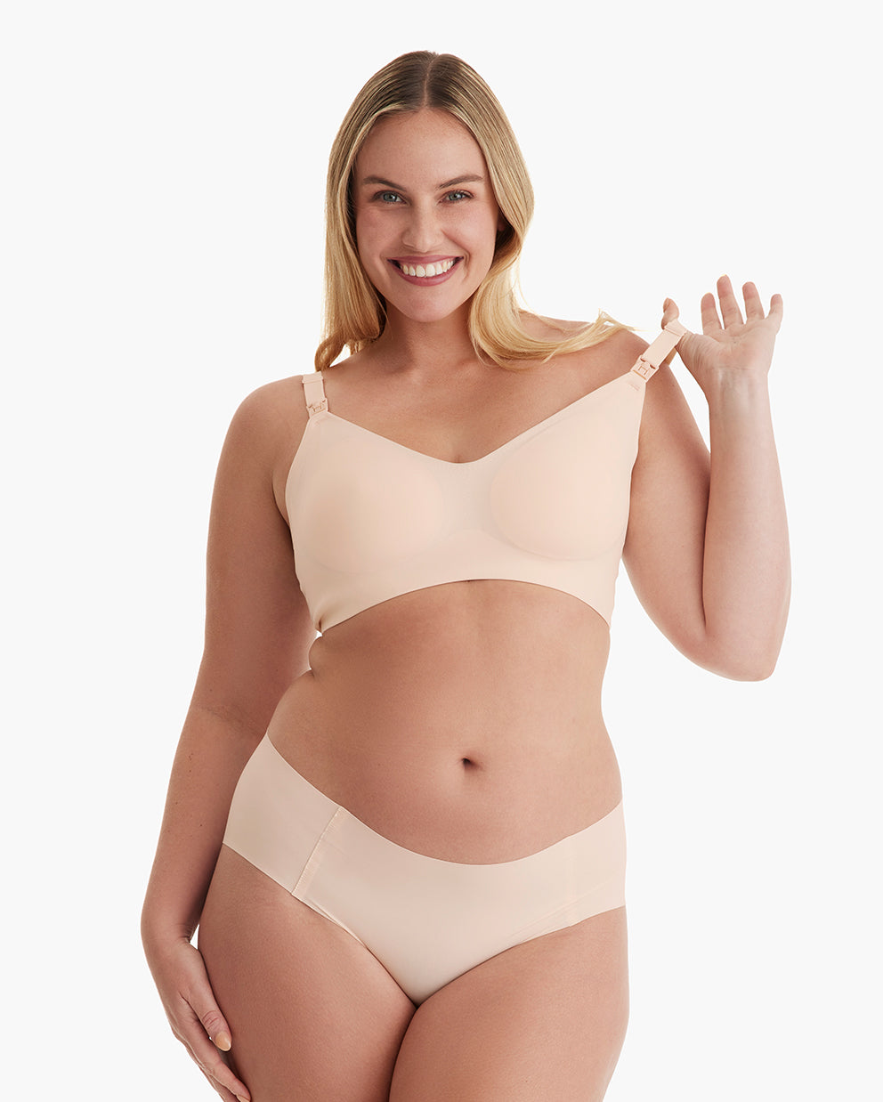 Light peach Ultra Soft Seamless Nursing Bra YN21. Model displays easy M5 pump clips, V-neck, and smooth comfort.