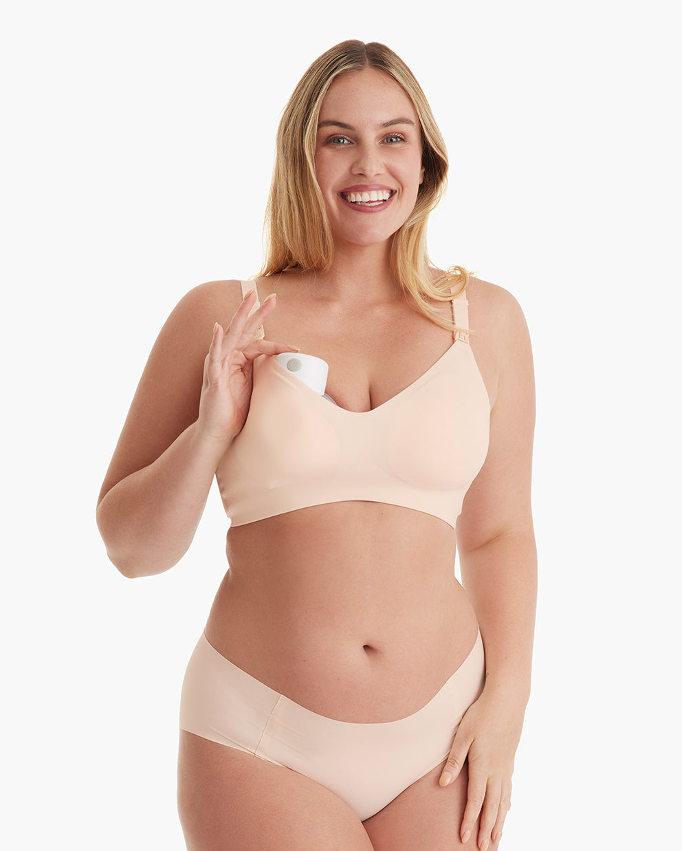 Model in light peach Ultra Soft Seamless Nursing Bra YN21 demonstrating M5 pump compatibility, V-neck comfort.